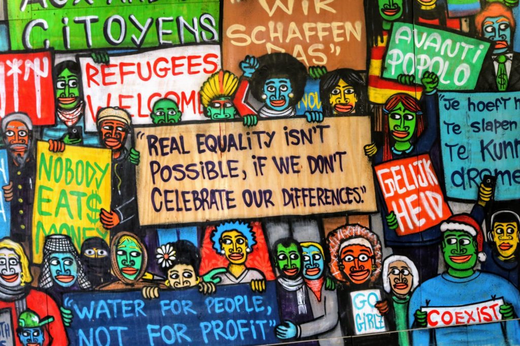 Very colourful poster about equality in our society, refugees and immigration